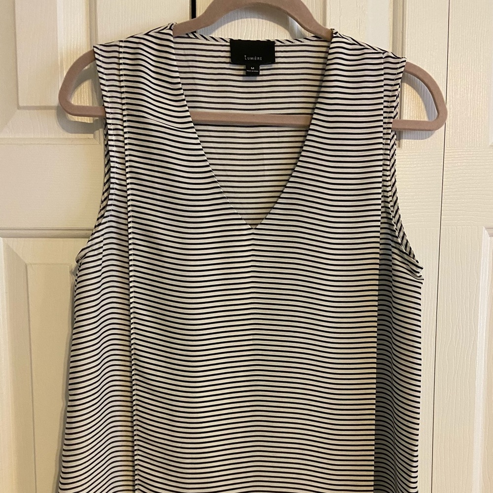 Cute blouse! Dress up or down.